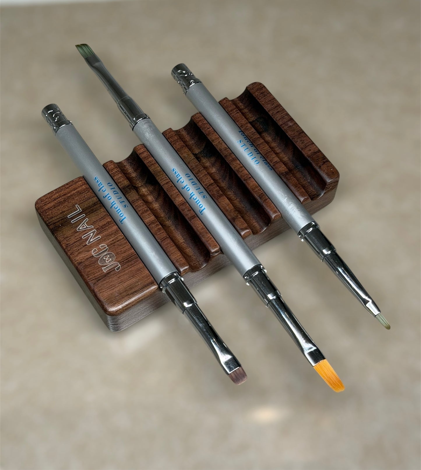 Neglepenselholder i tre